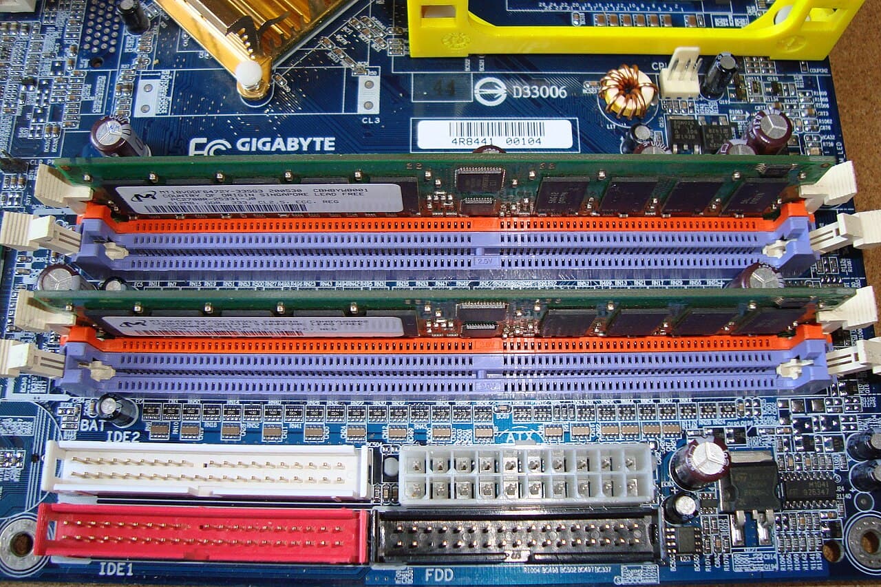 DDR memory modules seated in the dual-channel slots of a desktop motherboard.