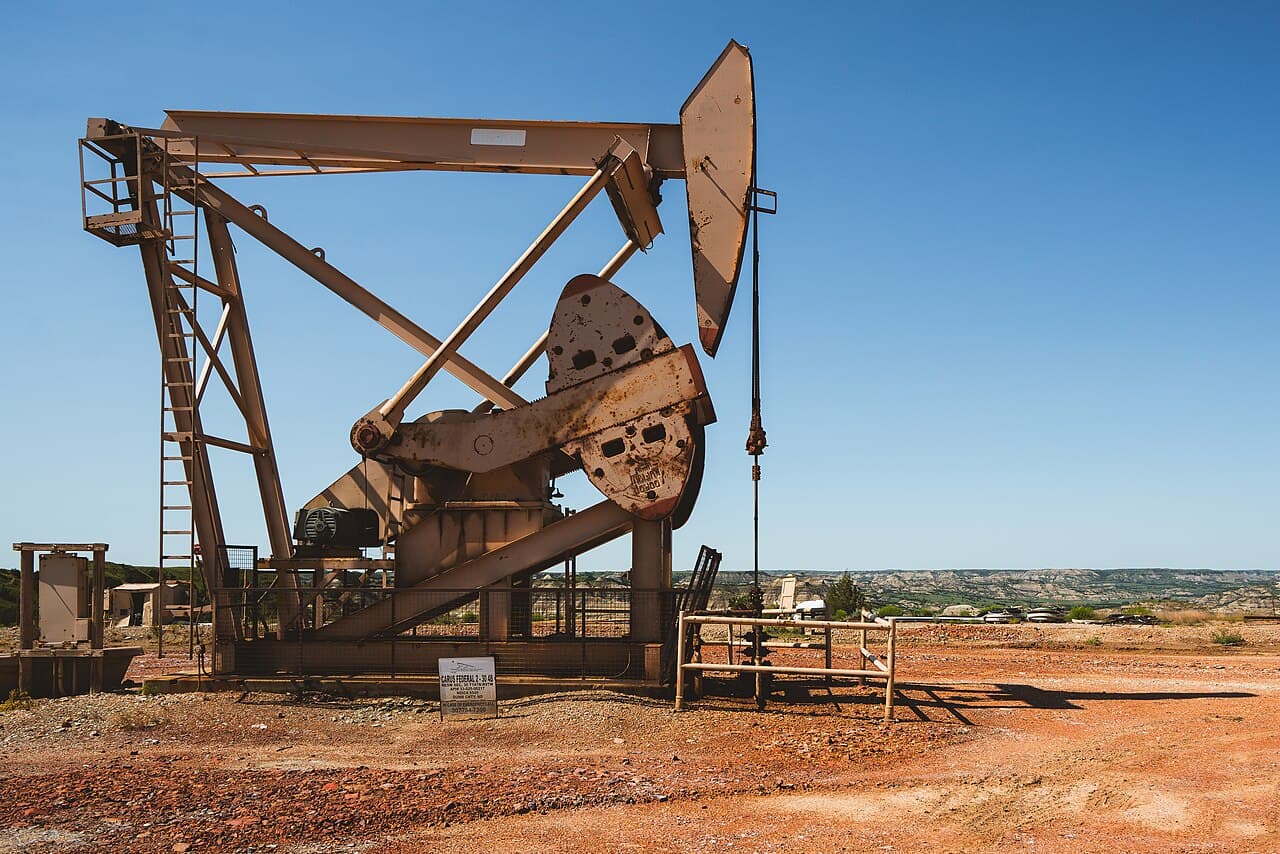 A pumpjack on an oil well pad in western North Dakota, near Theodore Roosevelt National Park.